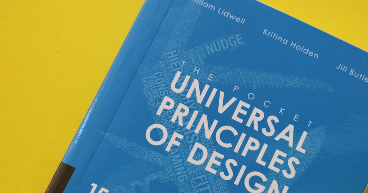 blue and white book on yellow surface